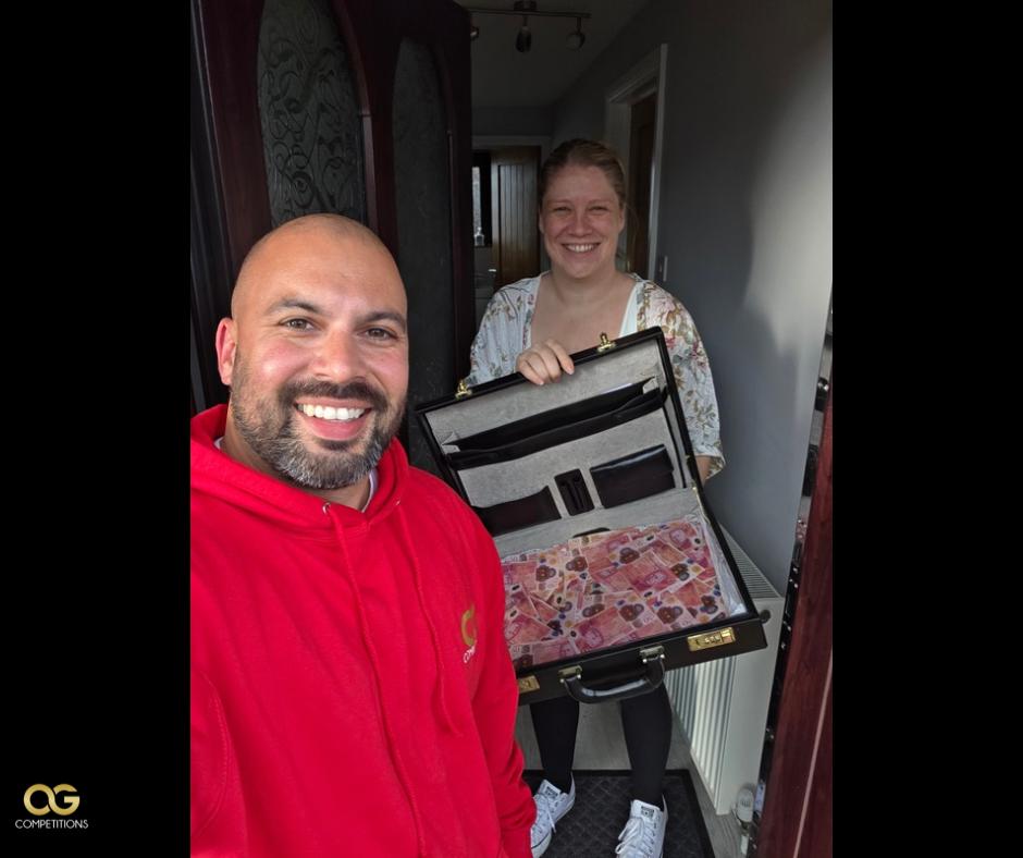 An OG Competitions winner with their prize